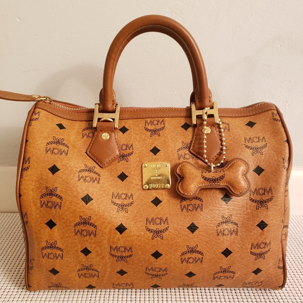 Authentic MCM boston bag with bone charm